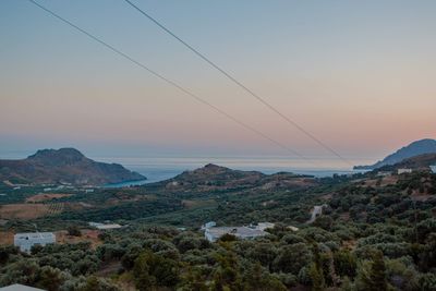 Scenic view of mountains against sky during sunset