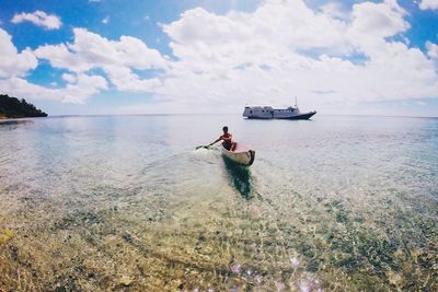 People on boat in sea