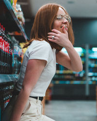 Midsection of woman standing at home