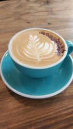 Close-up of cappuccino on table