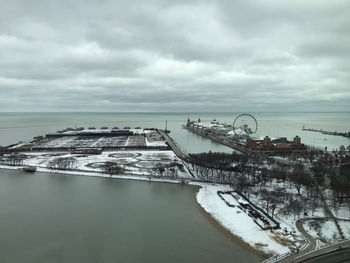 Aerial view of bridge over river against sky