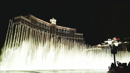 Low angle view of illuminated built structure