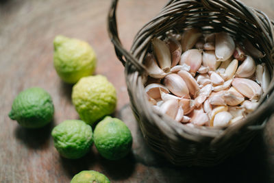 High angle view of chopped vegetables in basket on table