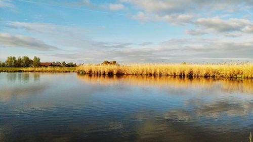 Scenic view of lake against sky