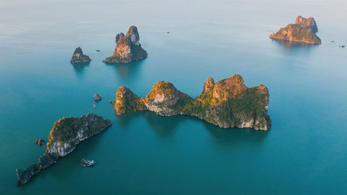 High angle view of rocks in sea