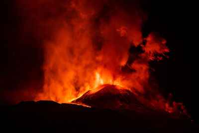 Scenic view of volcanic mountain during night