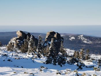 Scenic view of snowcapped mountains against sky