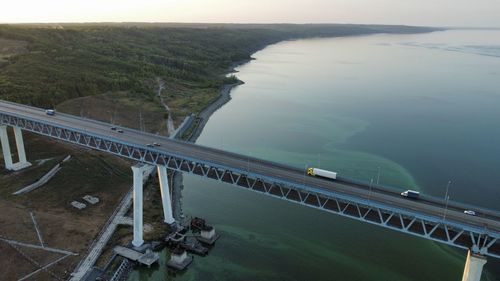 High angle view of bridge over sea against sky