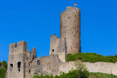 View at the ruin castle monreal or philippsburg in monreal, eifel, germany