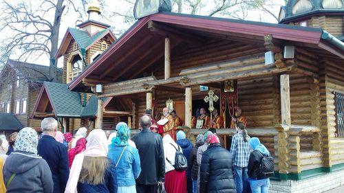 People standing on wooden structure