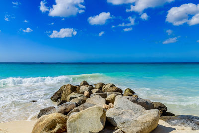 Scenic view of sea against blue sky