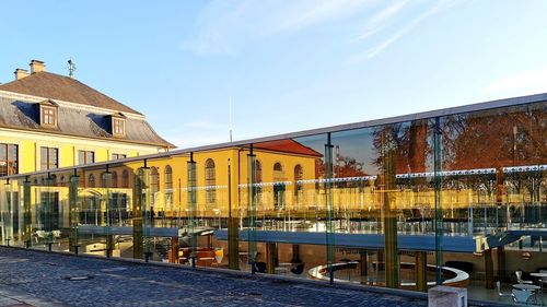 Buildings in city against sky