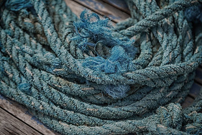 Full frame shot of rope tied on wood