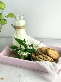  milk and cookies on table