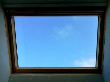 Low angle view of built structure against blue sky