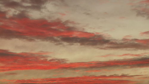 Low angle view of dramatic sky during sunset