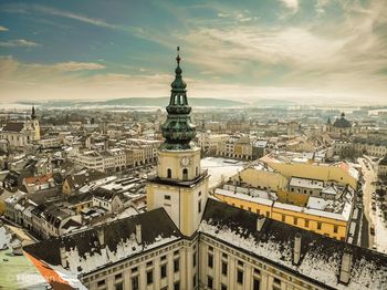 High angle view of city buildings against sky