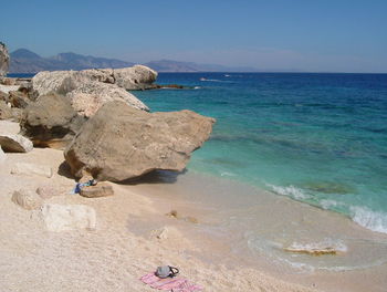 Scenic view of sea against clear blue sky