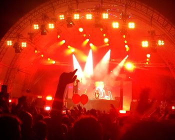 People enjoying music concert