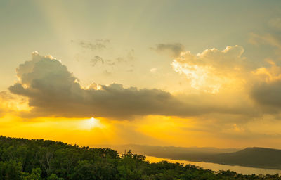 Low angle view of dramatic sky during sunset