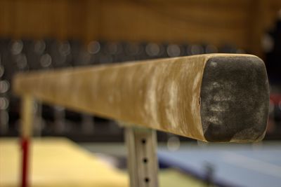 Close-up of balance beam in gym