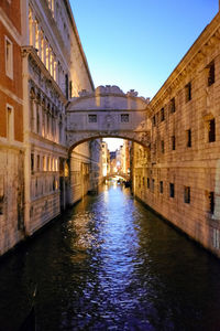 View of canal along buildings