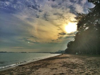 Scenic view of sea against cloudy sky