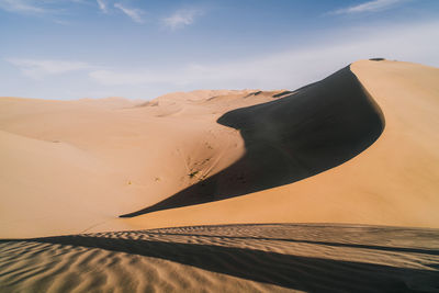 Scenic view of desert against sky