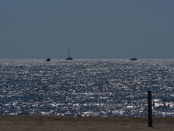 Scenic view of sea against clear sky