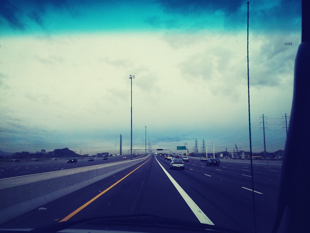 HIGHWAY AGAINST SKY