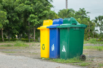 Garbage bins by road