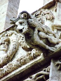 Low angle view of statue against sky