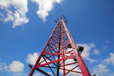 Low angle view of crane against blue sky