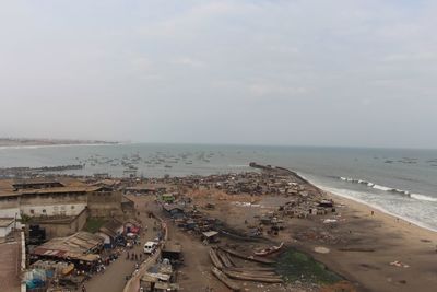 High angle view of people on beach against sky