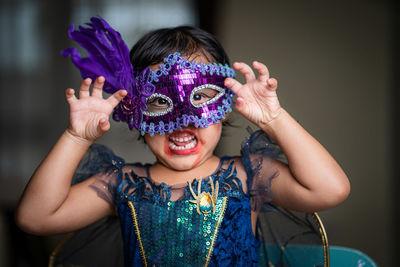 Portrait of cute girl in halloween costume.