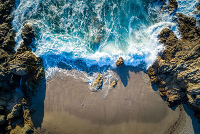 High angle view of rocks on beach