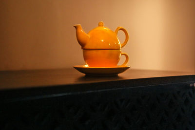 Close-up of tea cup on table