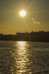 Sun shining over sea