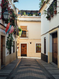 Alley amidst buildings in city