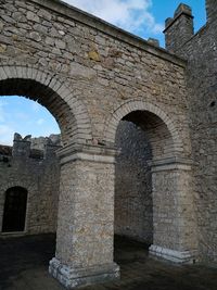 Low angle view of historic building against sky