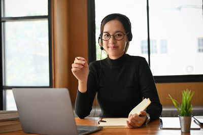 Businesswoman working at office