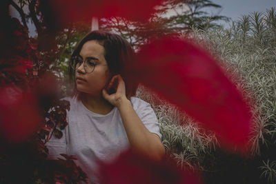 Portrait of young woman looking away