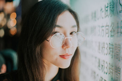 Close-up portrait of young woman