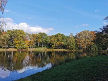 Scenic view of lake against sky during autumn