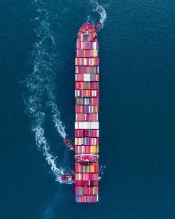 High angle view of boat sailing in sea