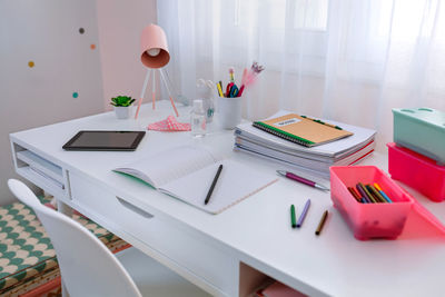 High angle view of multi colored pencils on table