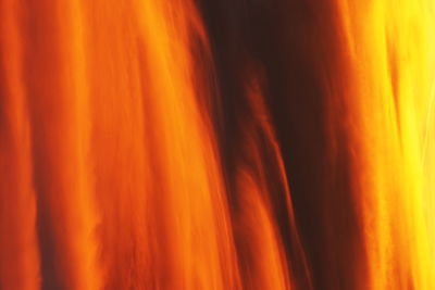 Full frame shot of fire against orange sky