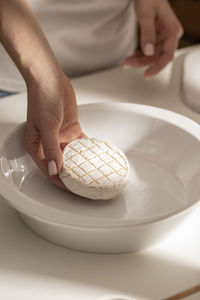 Midsection of man preparing food