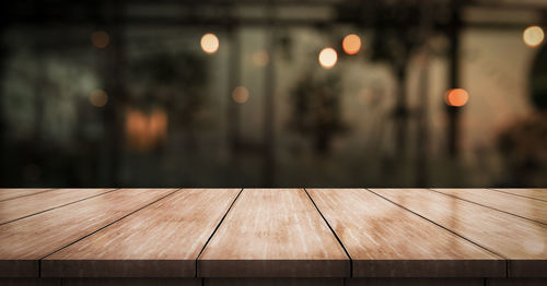 Close-up of illuminated lights on table