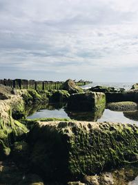 Scenic view of rocks against sky